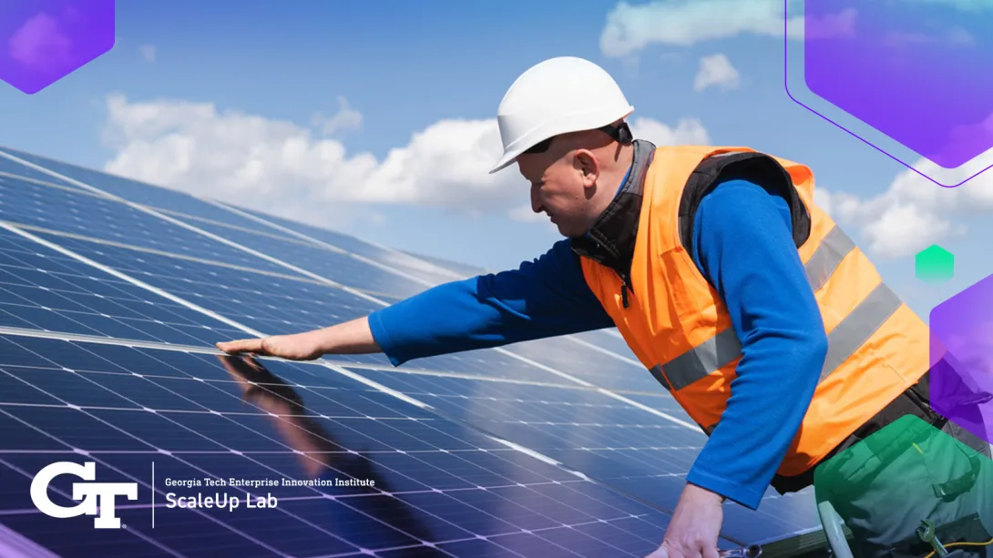 man working on solar panels